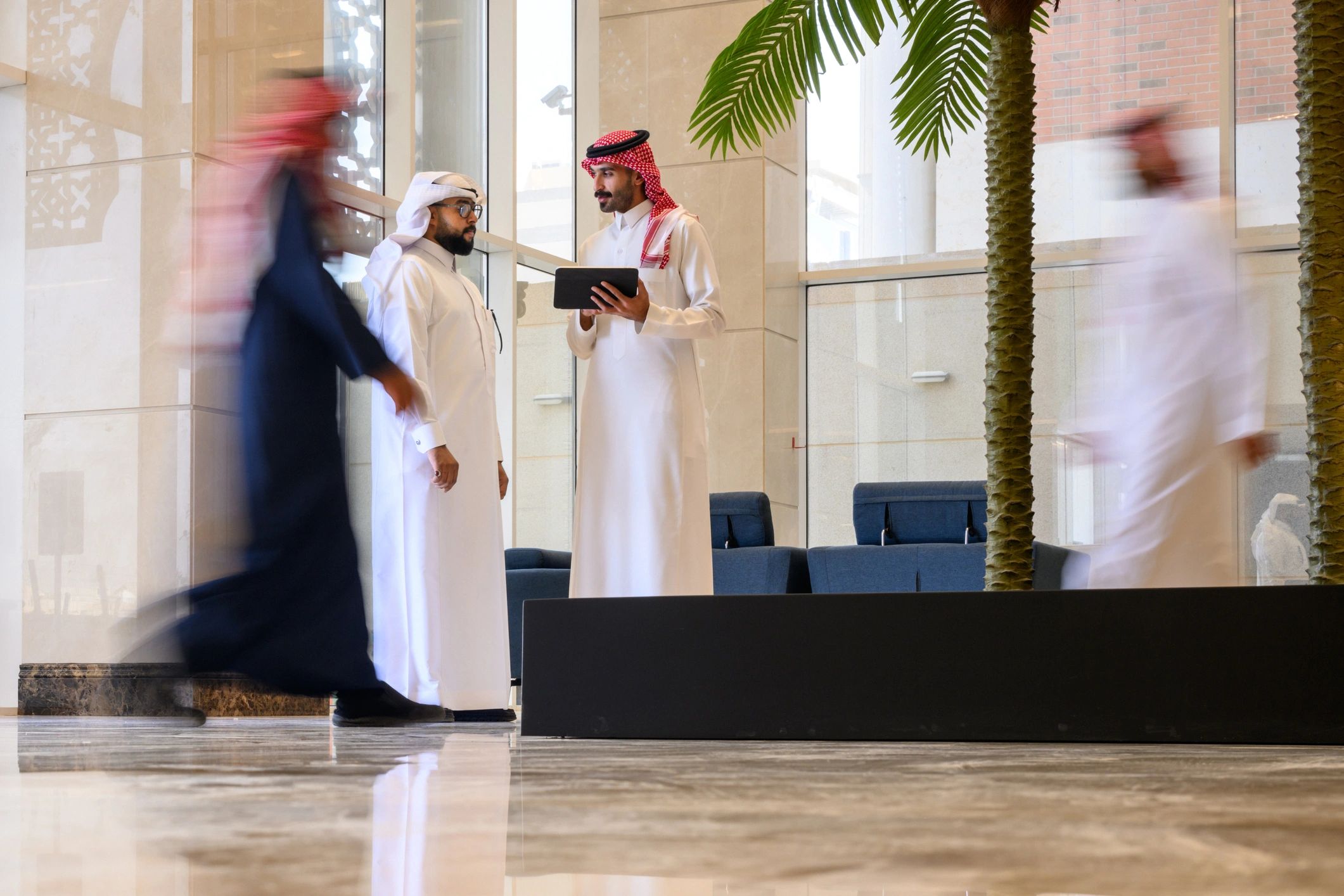 Business professionals discussing plans in a hospitality setting
